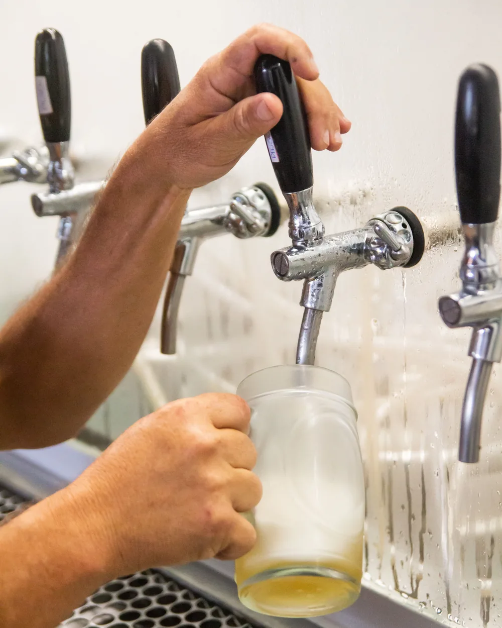 Sample photo: beer being poured from a steel tap